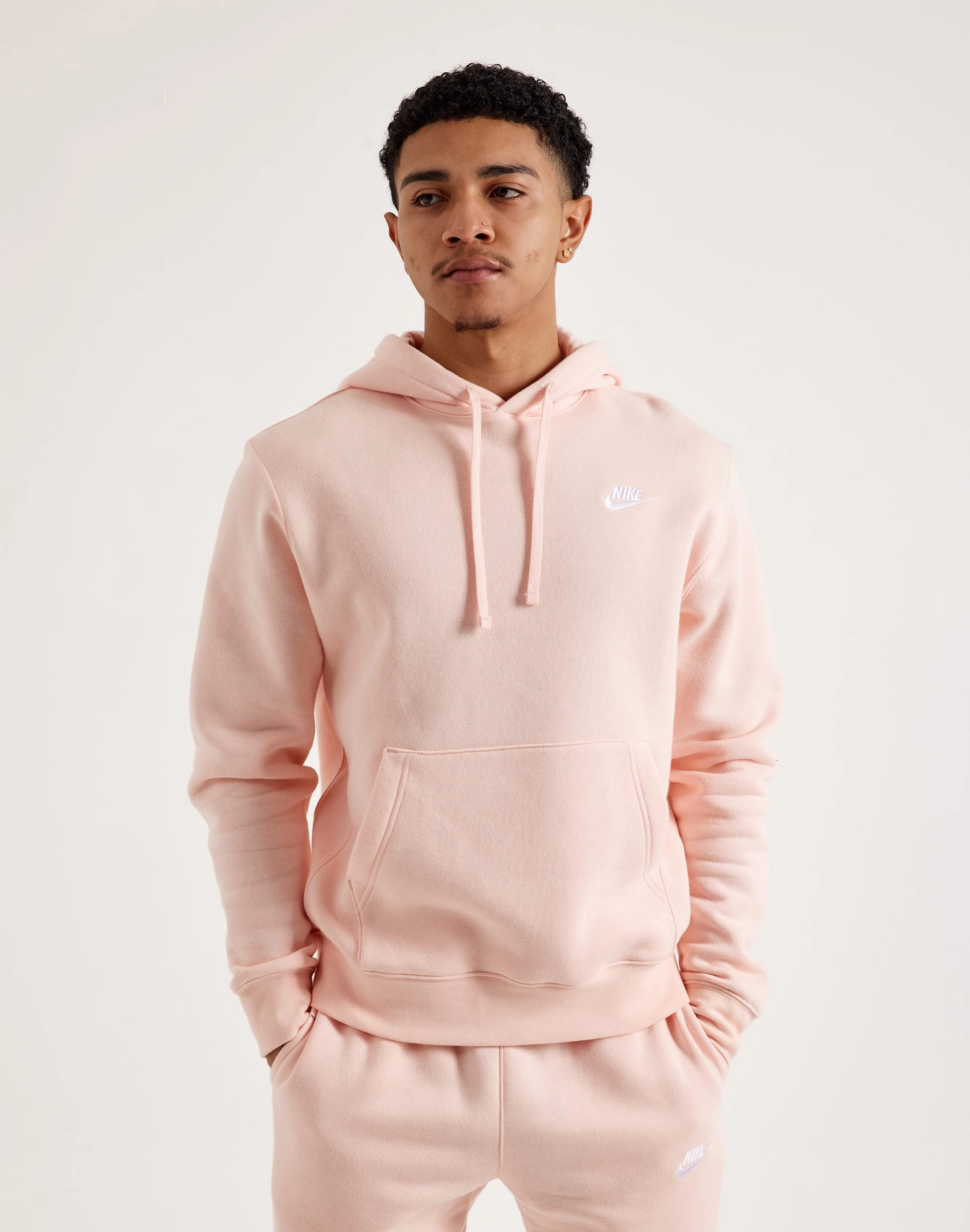 Nike Club Fleece Pullover Hoodie Wardrobe staples Sustainable fashion practices