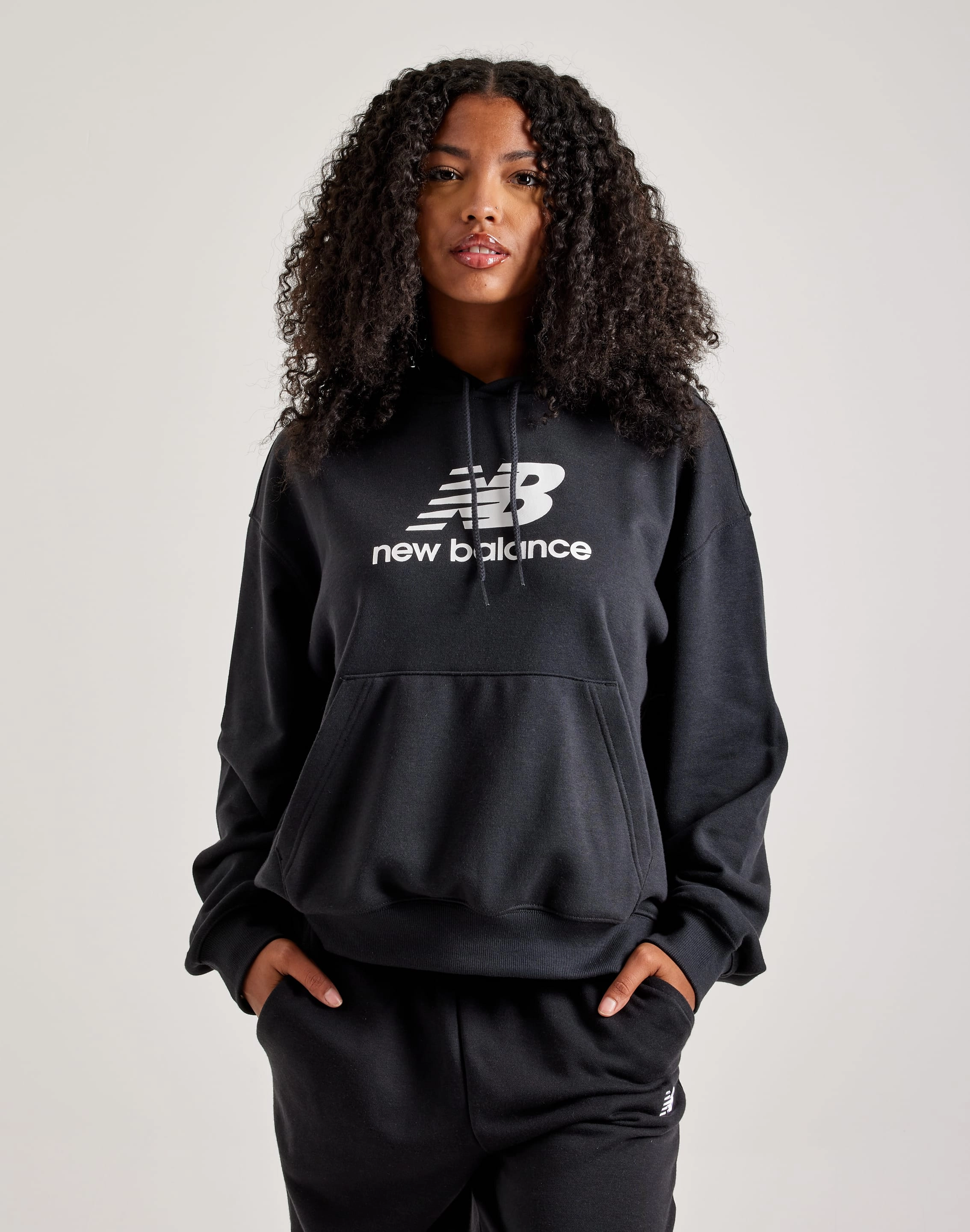 Free shipping offers New Balance Sport Essentials French Terry Logo Hoodie Athleisure fashion