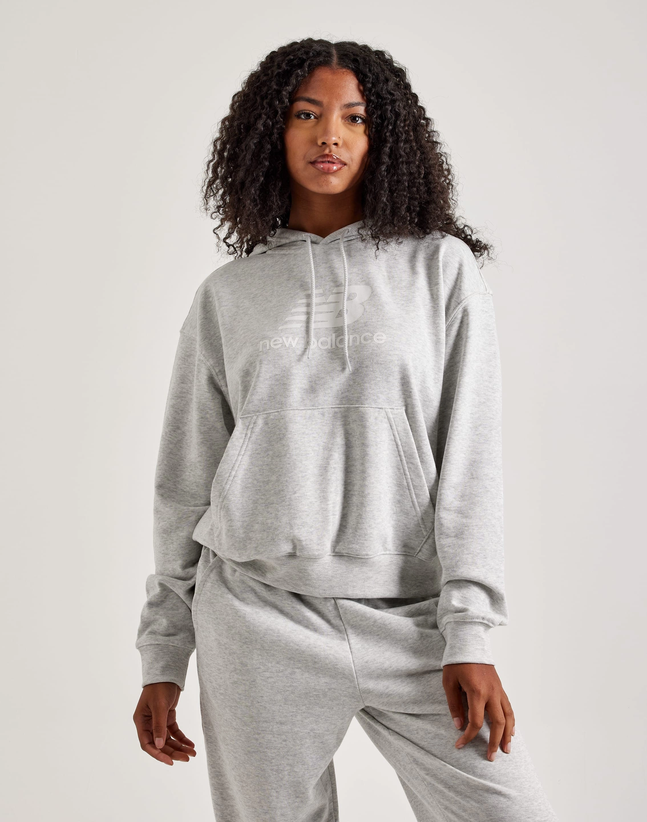 New Balance Sport Essentials French Terry Logo Hoodie Recycled fashion materials Fashion-forward items