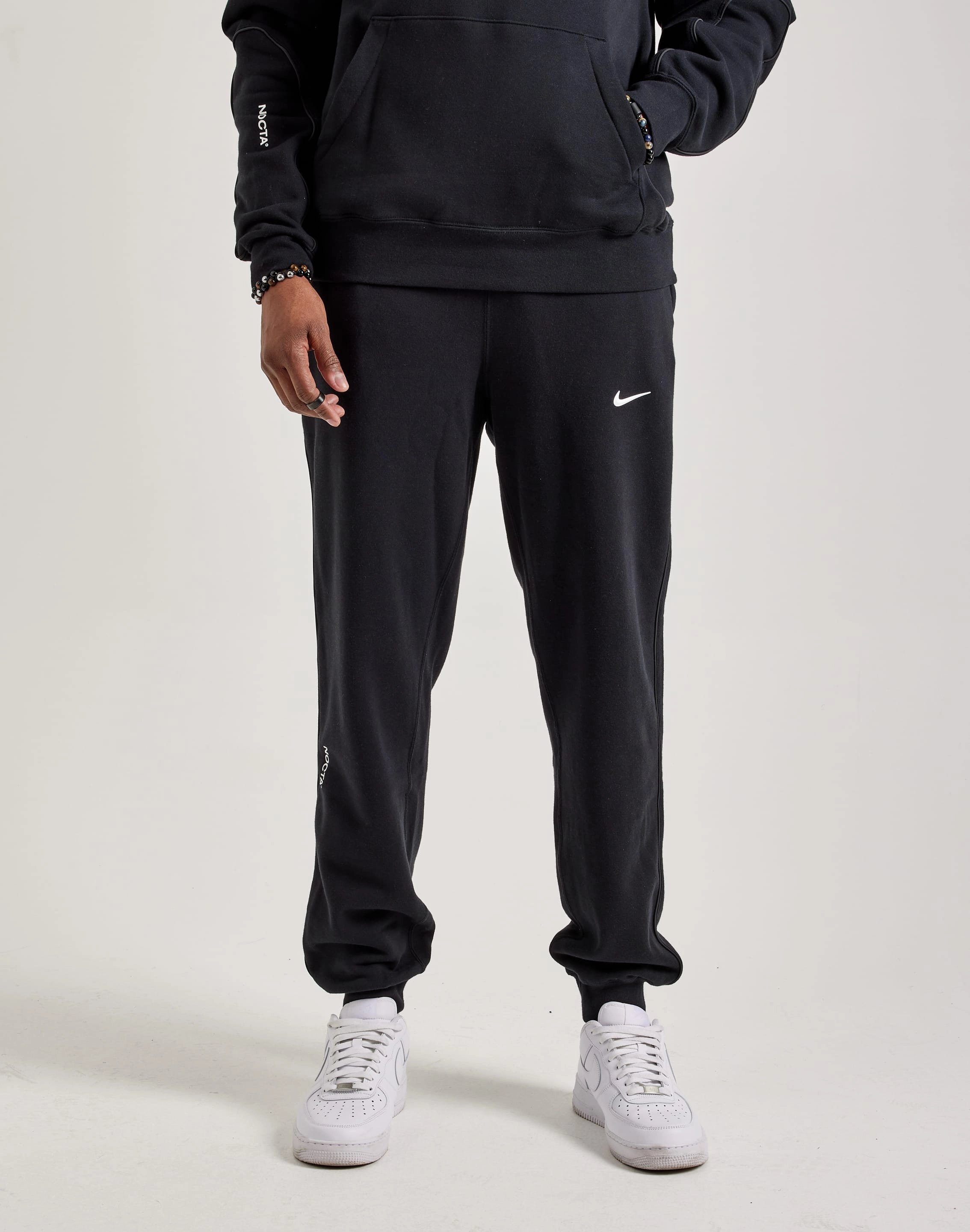Nike NOCTA Fleece Sweatpants Leather - material fashion Athleisure fashion