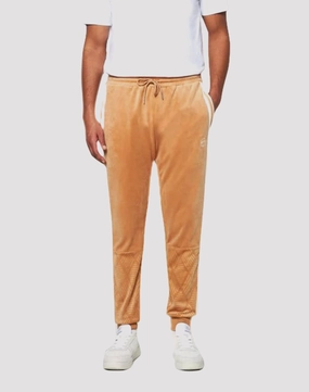 Modern fashion Sergio Tacchini Operations Inc Debossed Damarindo Velour Track Pants Fashion advice