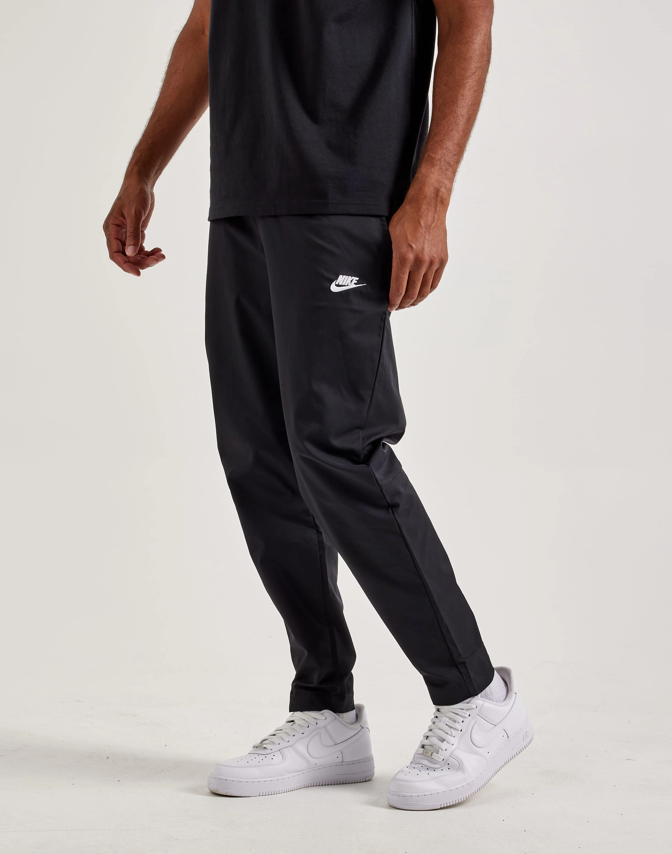 Nike Club Woven Tapered Leg Pants Fashion trends by region Fashion influencers' recommendations