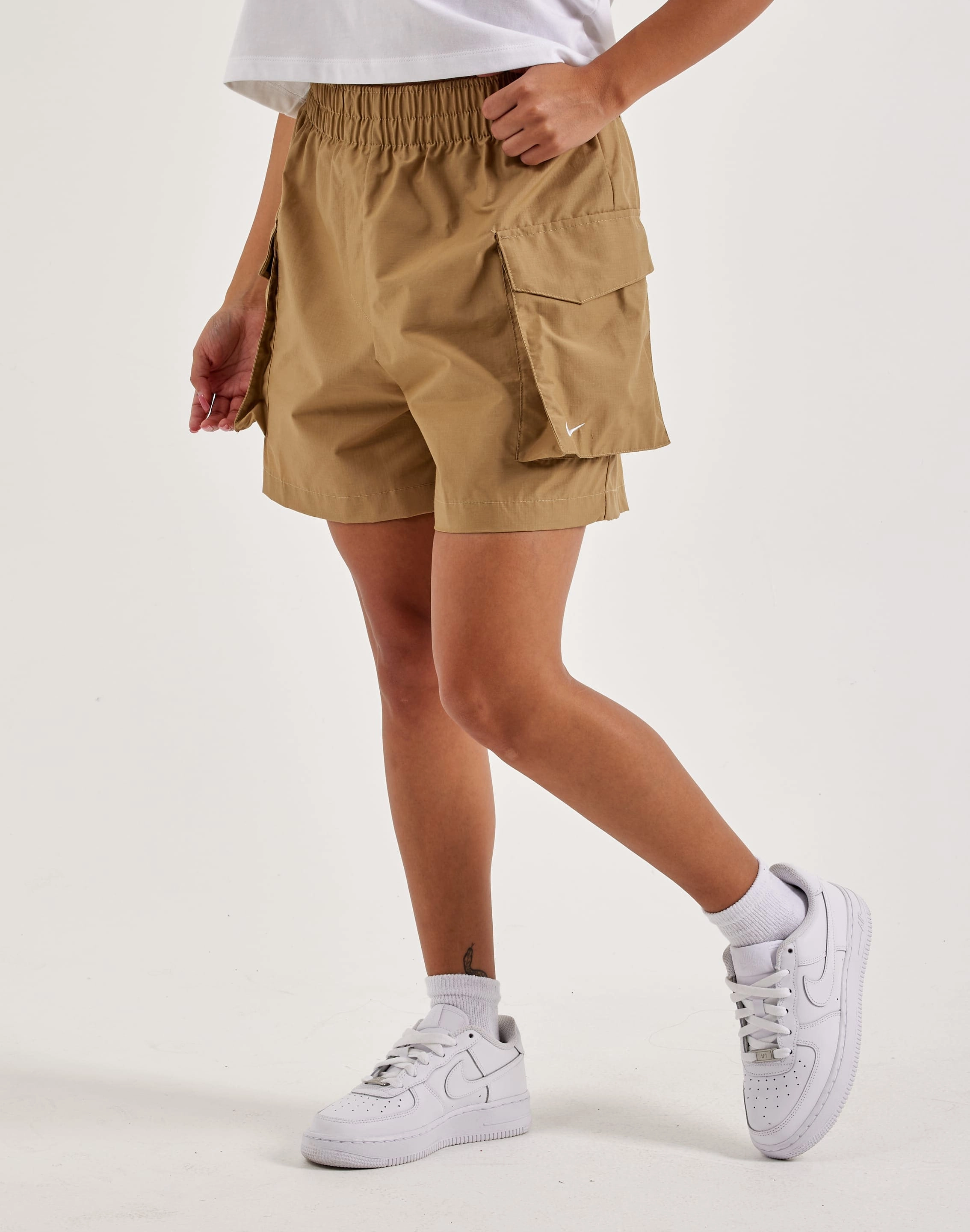 Nike Essential Woven High-Waisted Cargo Shorts Preppy style items Sustainable fashion practices