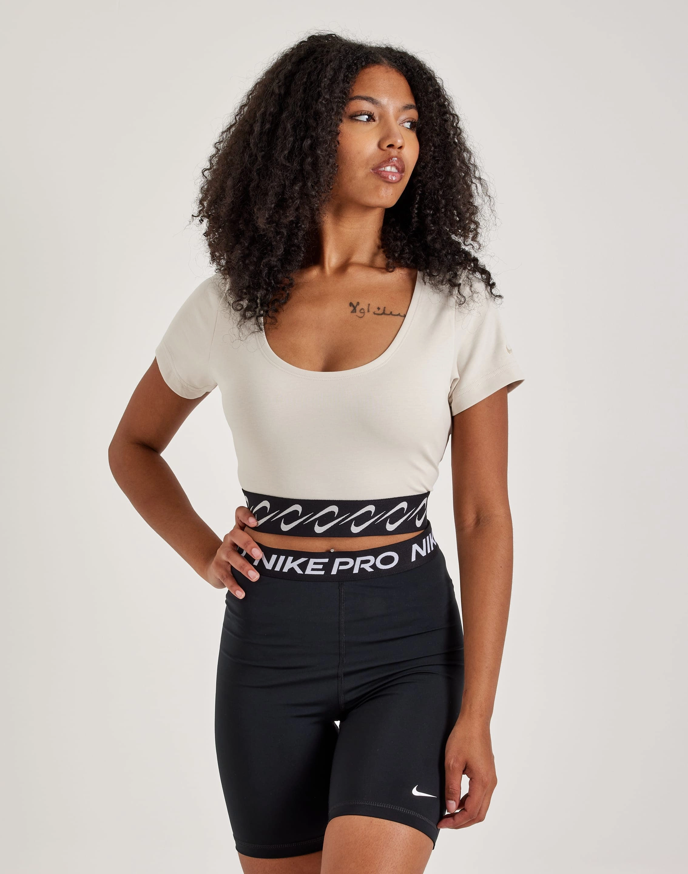 Recycled fashion materials Nike Essential Swoosh Top Fashion photography