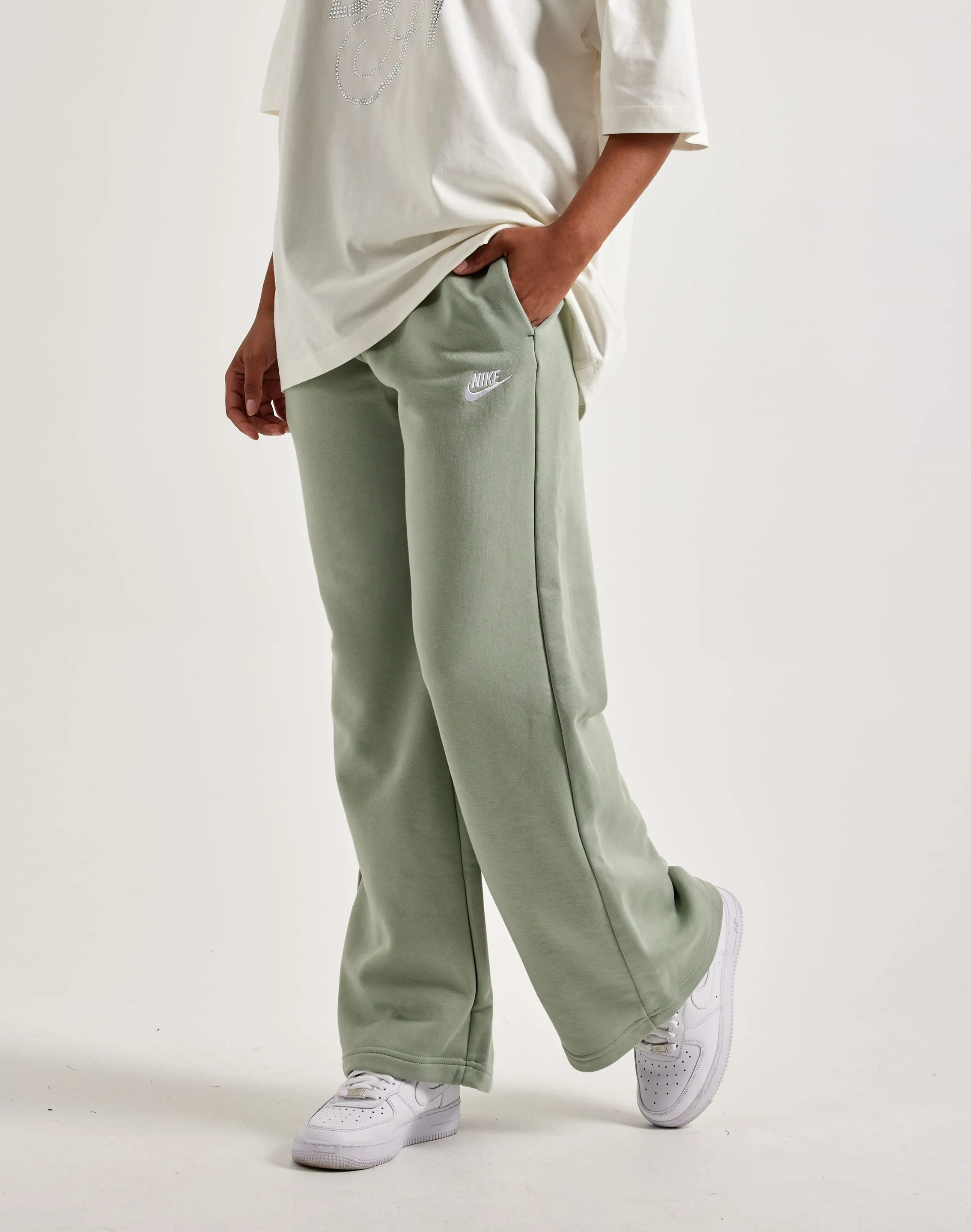 Retro fashion finds Nike Club Fleece Mid-Rise Wide-Leg Sweatpants Ethical fashion choices