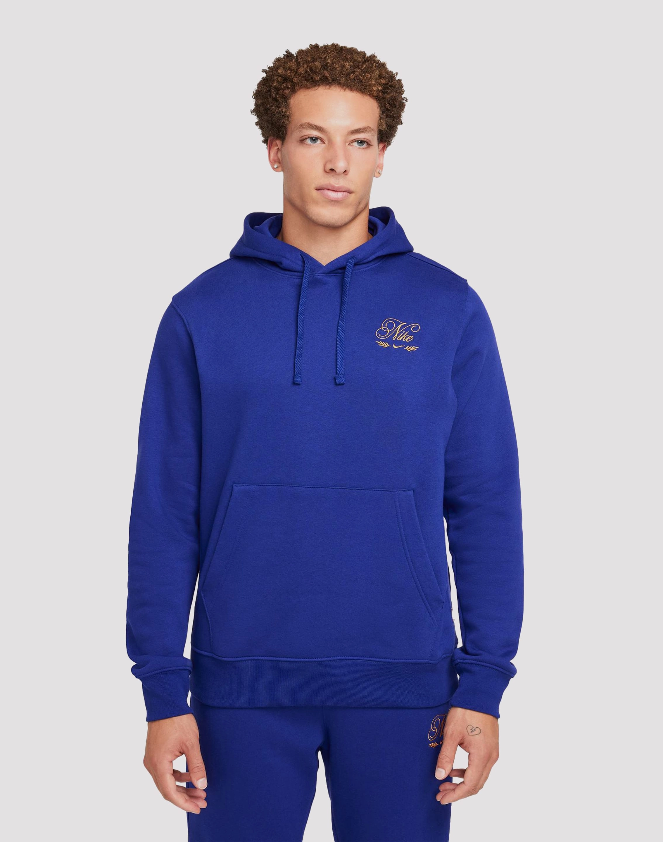 Nike Sportswear Club Fleece Pullover Hoodie Sustainable fashion practices Wardrobe staples